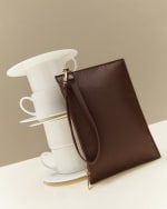 Neceser pequeño color marrón por 6€