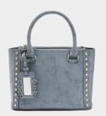 Bolso de mano estilo tote convertible a bandolera con tachuelas decorativas a 12.99€