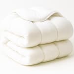 Couette tempérée en plume naturelle 200 g/m² à 34,99€