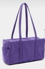 Bolso Bowling de nylon por 9.99€.