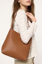 Bolso shopper con asa ajustable por 15.99€