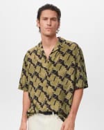 Mango camisa fluida estampada ocre por 11,99€