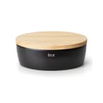 Panera ovalada de cerámica con tapa de madera y tabla de cortar 30x23x13,5 cm a 19.9€