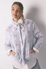 Women'Secret Bata polar pelo Jaquard por 17.99€.