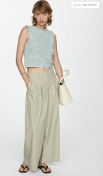 Top tweed con detalle deshilachado por 7.99€