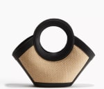 Cartera de paja con detalles revestidos por $18.743