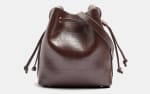 Parfois Bolso Bombonera con grabado animal por 9.99€.