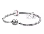 Set Pulsera con Dije Hermanas por Siempre por $159.200