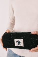 Neceser pequeño sherpa negra Mafalda por 7.99€