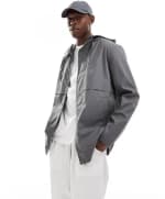 Chubasquero gris carbón ASOS DESIGN por 10,50€
