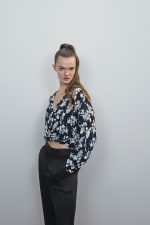 Cuerpo de escote pico y manga larg de Zara por 7,99€