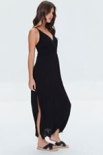 Vestido negro por Forever21 en $22
