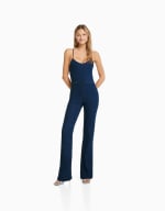 Mono denim largo elástico espalda descubierta por 5,99€