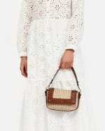 Bolso mini de hombro y bandolera efecto rafia con detalles metálicos por 12€
