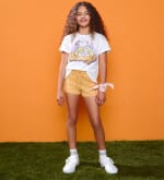 Sport deportivo de niña con ribete Snoopy por 3,99€.