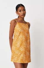 Mustard floral print tie strap cami dress for £6.40.