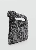 Bolso de mano con lentejuelas por 20,99€.