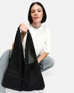 Bolsa de hombro denim color negro por 7,80€