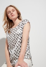 Profiteer van tot 50% korting op blouses bij Eterna