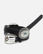 Cinturón fino con detalles metálicos por 3,90€