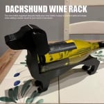 Soporte para botella de vino tinto con diseño perro salchicha por 4,49€