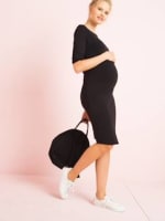 Sélection de vêtements de grossesse à -70% (tailles 34 au 48) - Ex : robe tube noire à 7,79€