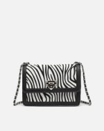 Bolso bandolera de fiesta con estampado animal print por 12€