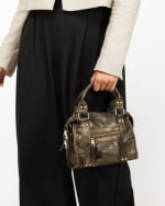 Bolso Tote pequeño desgastado y con asa bandolera extraíble por 9€.