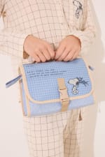 Women'secret Neceser mediano azul Snoopy por 11,69€ (desde la App) en web 12,99€