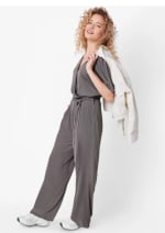 Mono de mujer, con bolsillos laterales tipo ojal. en color gris por 9.99€