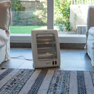 Estufa Eléctrica Kioto GR25-EC800 Blanco Rebaja Internet $8.990 solo en abc, cl