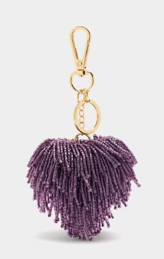 Parfois Llavero con charm de pompón con cuentas por 9.99€.