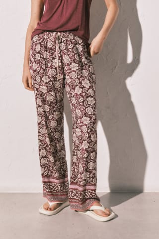 Women'Secret Pantalón largo estampado boho por 10.79€.