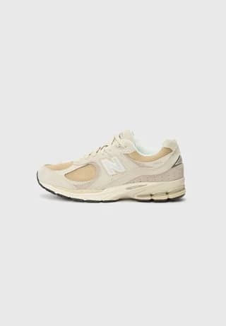 New Balance U2002 - Sneakers voor €81,86 dmv code bij Zalando
