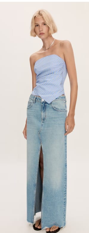 Falda vaquera bajo deshilachado por 9.99€