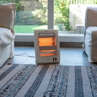 Estufa Eléctrica Kioto GR25-EC800 Blanco Rebaja Internet $8.990 solo en abc, cl