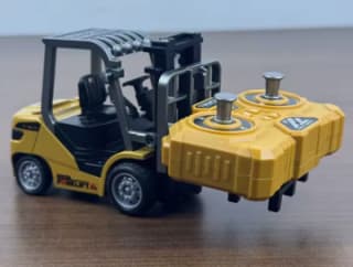 Mini carretilla elevadora de aleación Radio control 1/64 2,4G por 11,19€