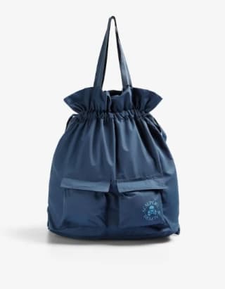 Scalpers Bolsa de niño lisa con bolsillos delanteros por 19.90€.