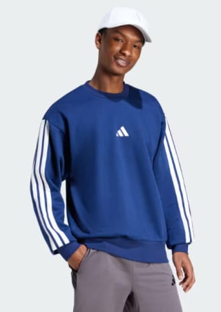 Polerón Essentials Fleece 3 Tiras por $19.990