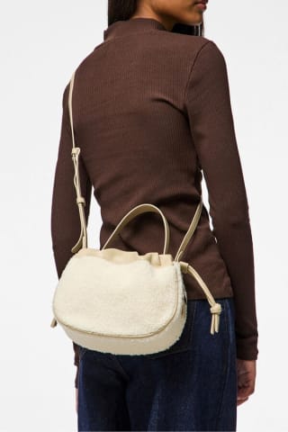 Bolso bombonera teddy detalles piel Pieces por 15.39€
