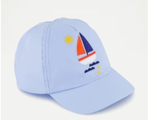 Gorra de bebé azul Baby El Corte Inglés por 5.19€.