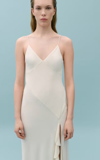 Vestido asimétrico con volantes por 19.99€