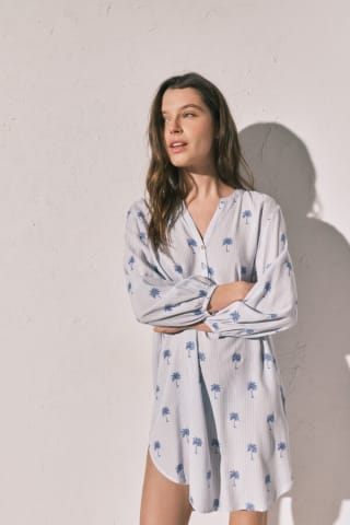 Women'Secret Camisola corta rayas palmeras por 12.59€.