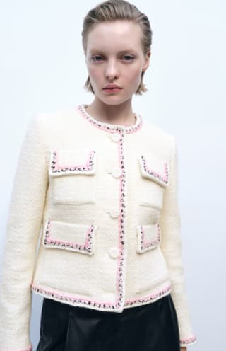 Chaqueta tweed con ribetes a contraste por 19.99€