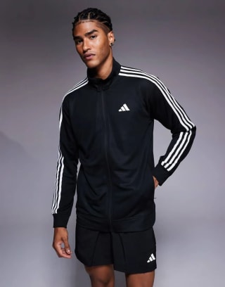 Adidas Chaqueta chándal negra 3 rayas varias tallas por 24€