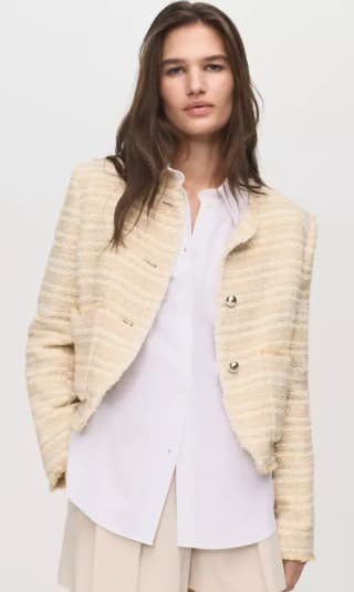 Chaqueta tweed botones joya por 17.99€