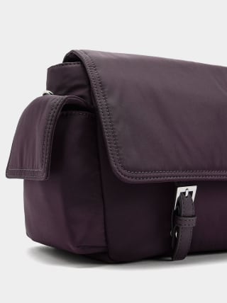 Parfois Bolso Bandolera de nylon con solapa por 9.99€.