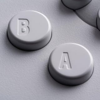 Mando 8BitDo 64 Bluetooth Blanco por 27€ en PcComponentes