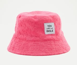 Gorro Bucket toalla flores de niña por 4.79€.