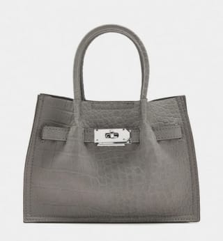 Bolso Tote estampado animal por 15.99€.